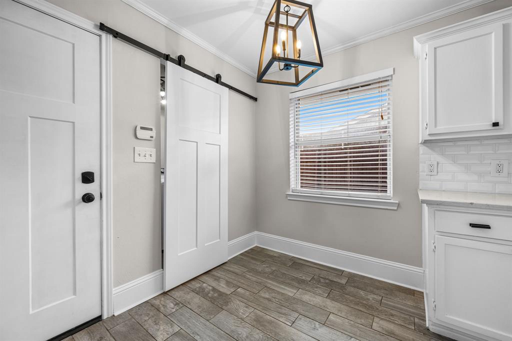 Flexible space at the other end of the kitchen in front of the laundry room.
