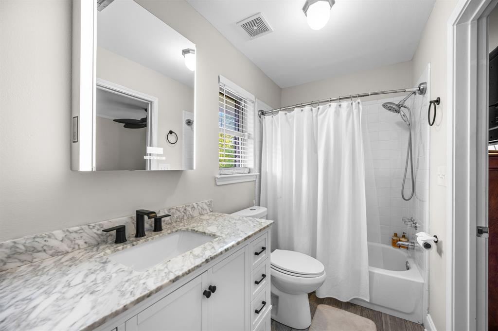 Jack and jill bathroom connecting bedrooms 2 and 3.