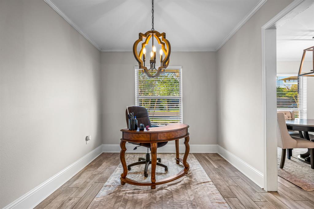 Currently used as a home office, this space is flexible, it could be more dining or living space.