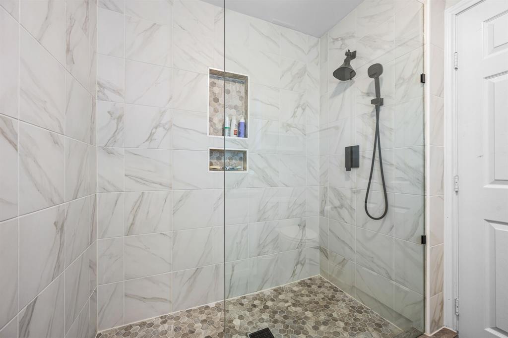 Amazing oversized shower in the ensuite primary bathroom.