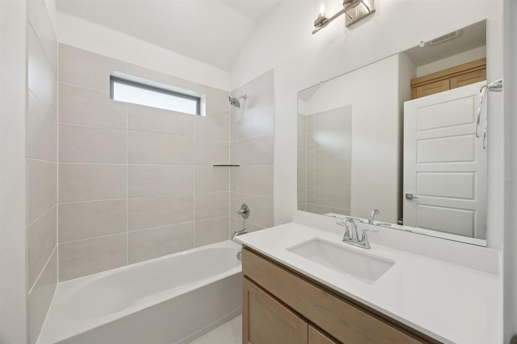 Bathroom in the Monet II home plan by Trophy Signature Homes – REPRESENTATIVE PHOTO