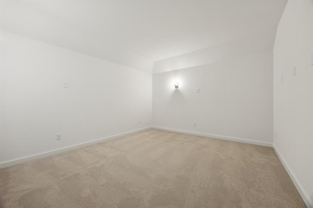 Media Room in the Monet II home plan by Trophy Signature Homes – REPRESENTATIVE PHOTO