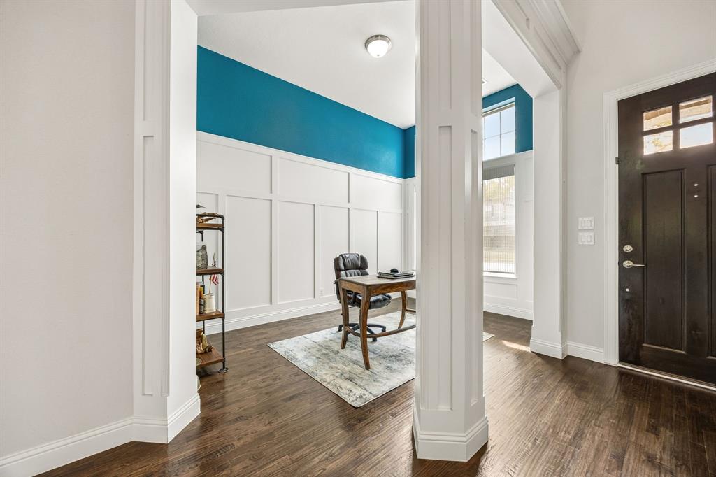 A bright, sophosticated entryway sets a dramatic, elegant tone the moment you step through the 8ft craftsman door. Rich, polished hardwood floors flow seemlessly guiding you into a light-filled open layout that effortlessly balances style and function.