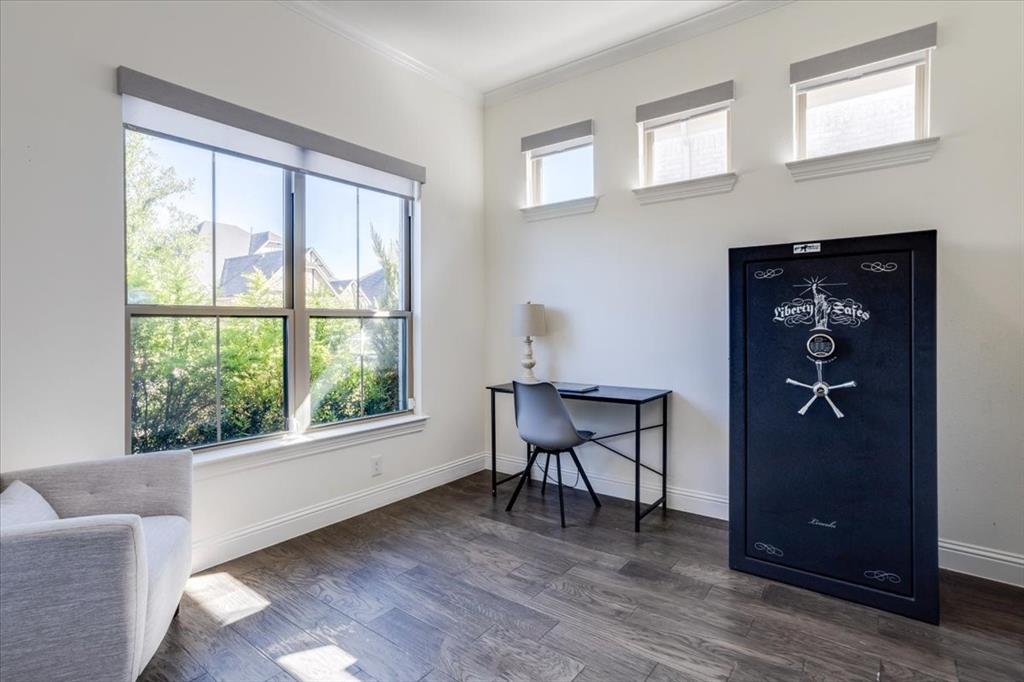 Dedicated study with an abundance of natural lighting and french doors.