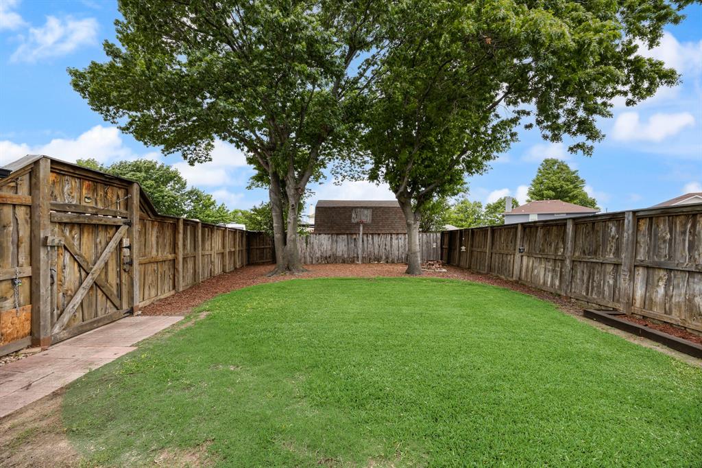 Large backyard with plenty of room for a pool, dogs, playset, etc.