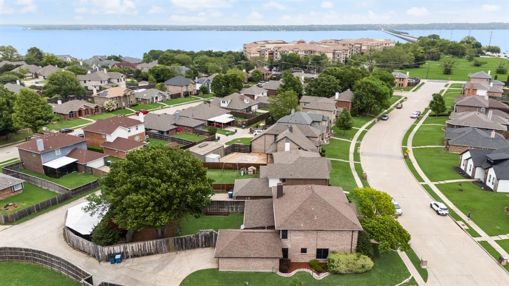 Extra long driveway - large corner lot. Big back yard plus extra covered parking thru gated alley entrance.