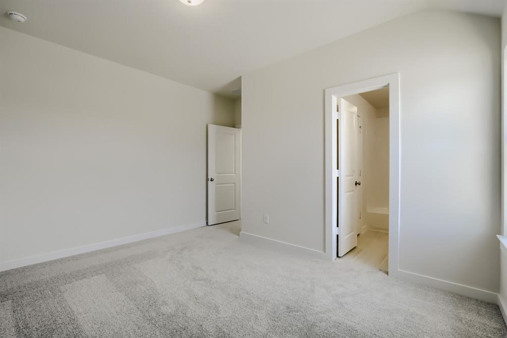 Neutral carpet flooring and light-toned walls