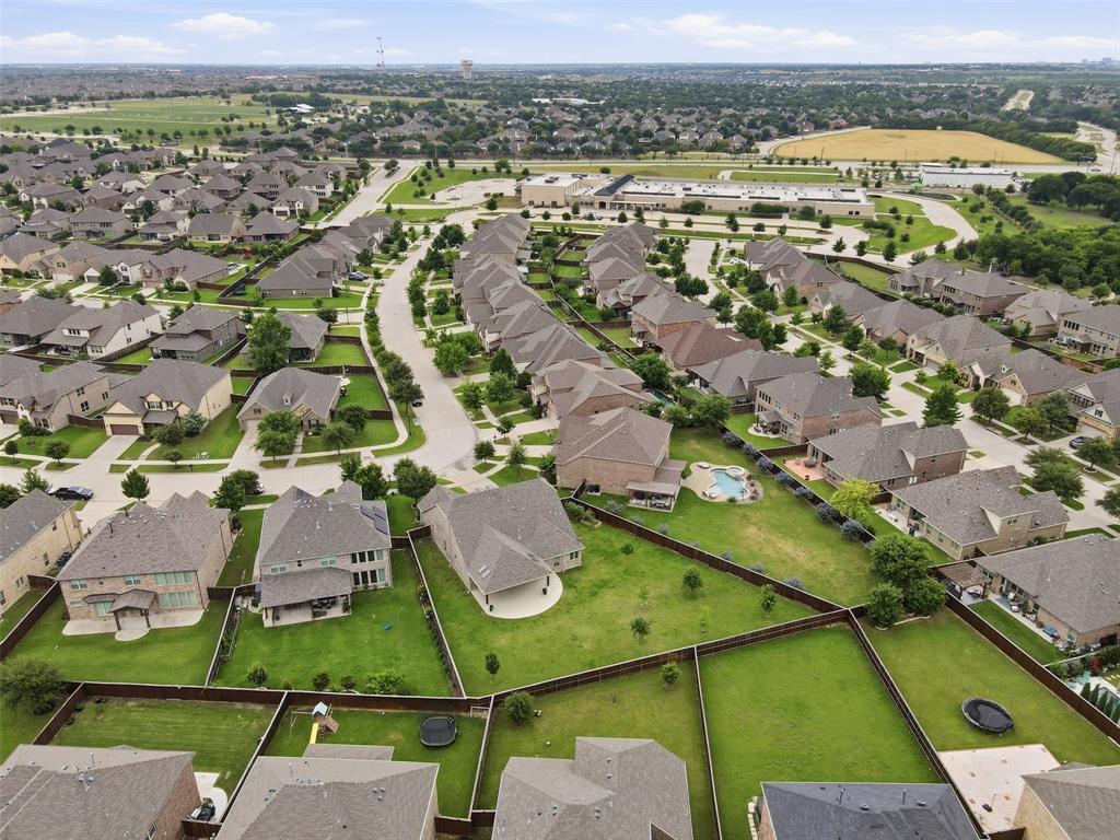 Can we talk about this backyard?! One of the largest lots around, with plenty of room for a pool, sports court, outdoor kitchen, or all three!