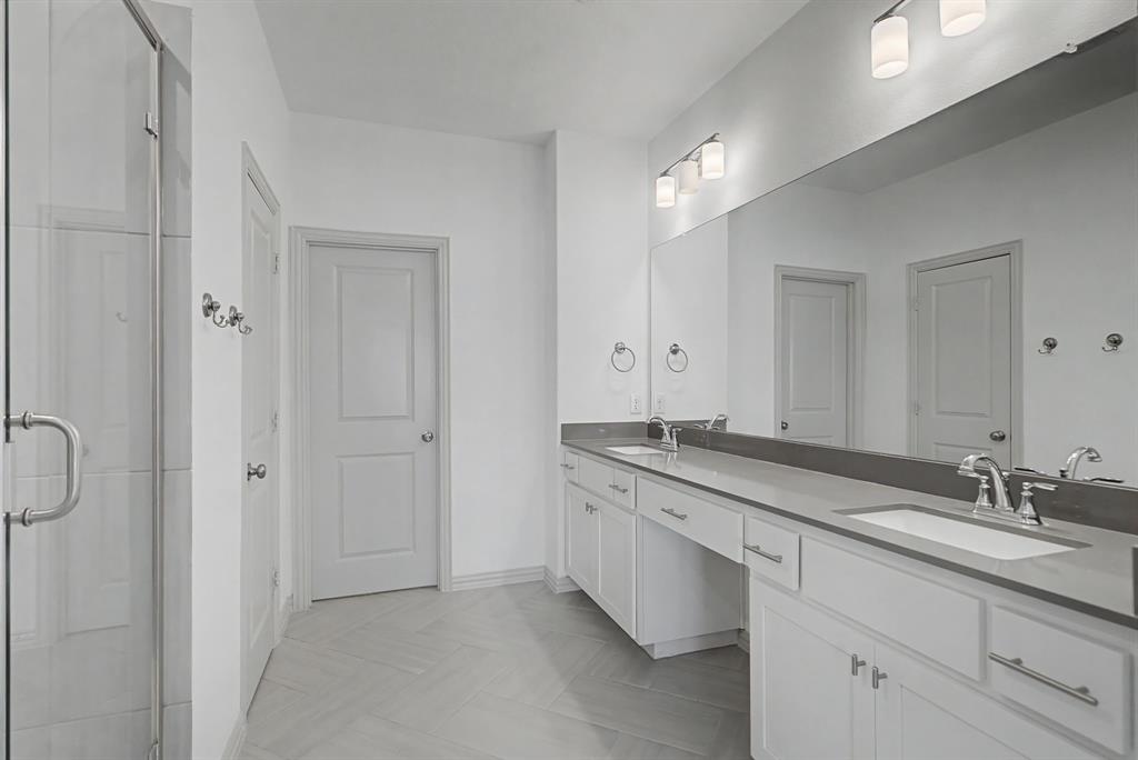 Dual vanity with undermount sinks and chrome fixtures