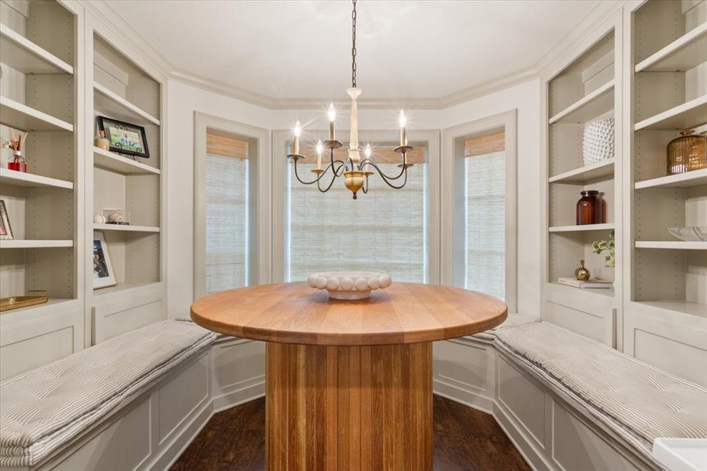 Built-in dining nook with integrated bench seating and patterned cushions