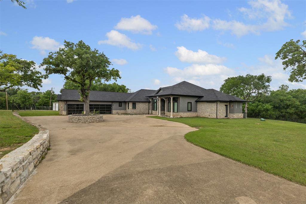 Welcoming driveway into the property. Room for lots of visitors and activities!