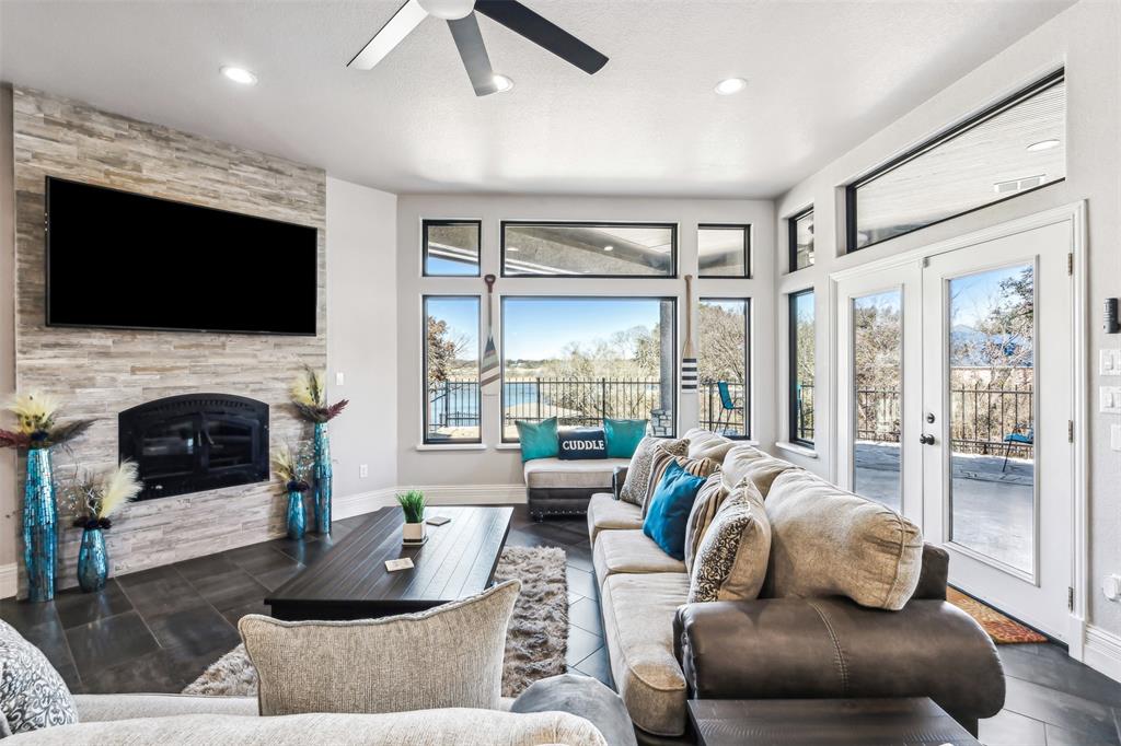 Wood burning fireplace living room with a lake view!