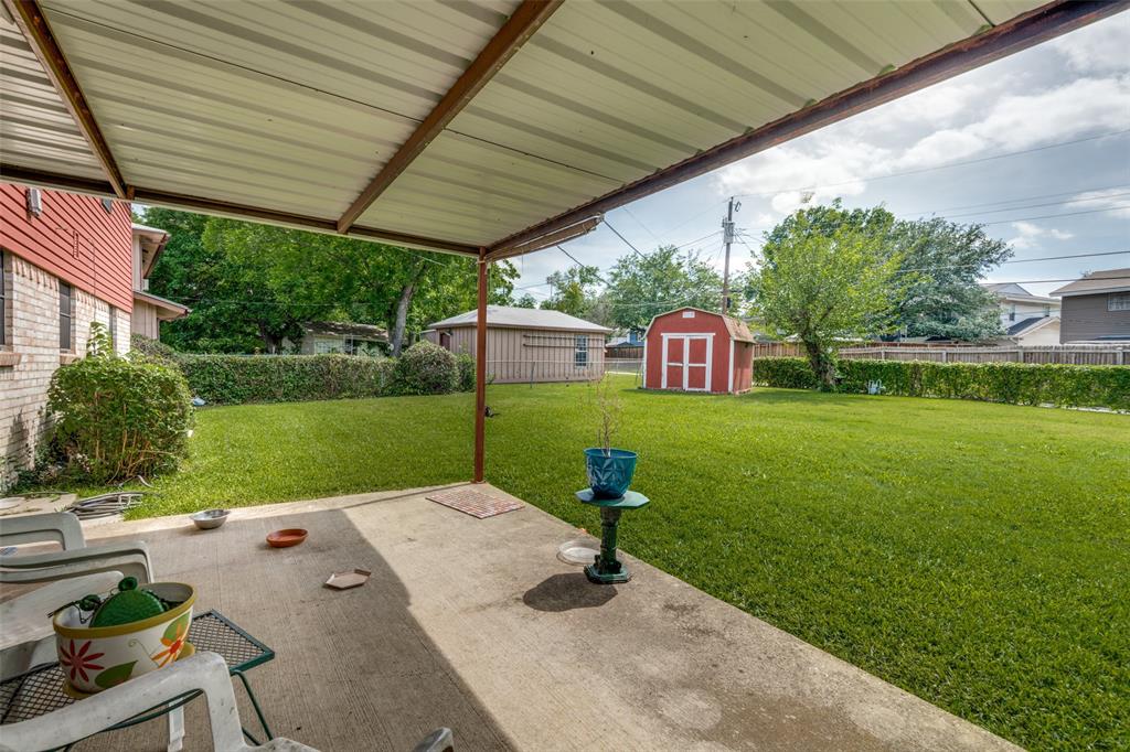 Covered patio featuring a concrete slab and metal roof structure