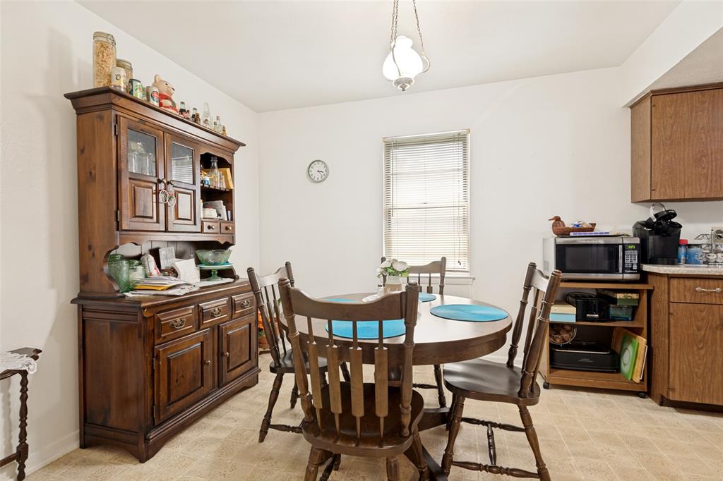 Open-concept dining area featuring a neutral color palette