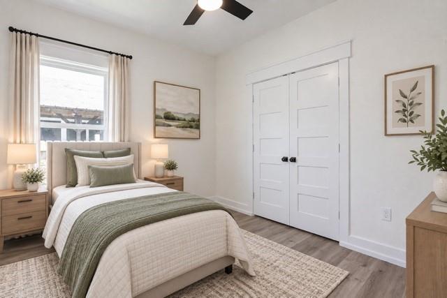 Virtual staging - Wood-finish flooring, white paneled closet doors, single window with trim, and a ceiling fan with light fixture Virtual staging - Wood-finish flooring, white paneled closet doors, single window with trim, and a ceiling fan with light fixture