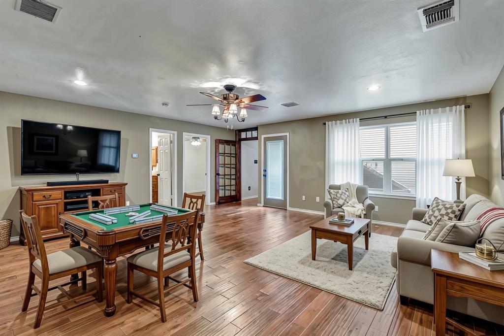 Upstairs game room Staged with ai to show you what a great space this is upstairs