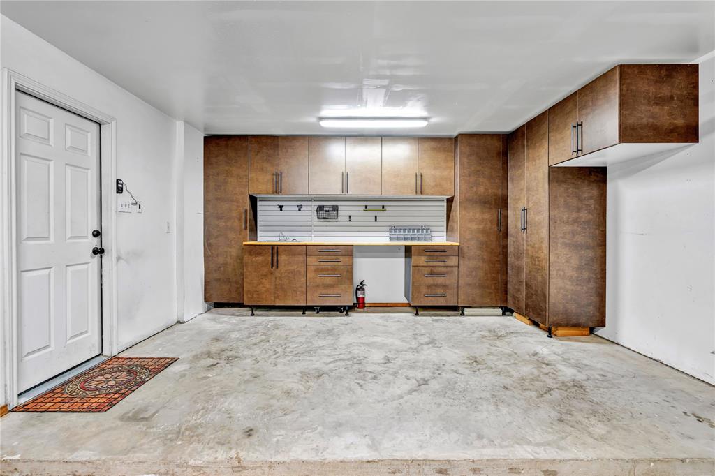 This shop is built into the garage and is conveniently located close to the kitchen