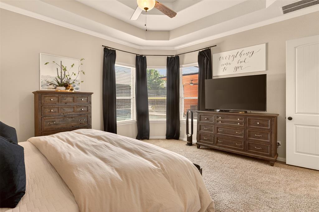Another view of the private primary retreat with direct access to the en-suite bathroom.