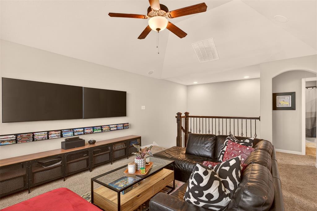 Open upstairs game room creates a comfortable second living and entertainment space.