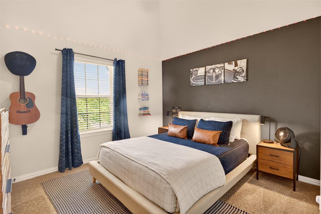 Well-sized secondary bedroom features natural light and space for a complete furniture arrangement.