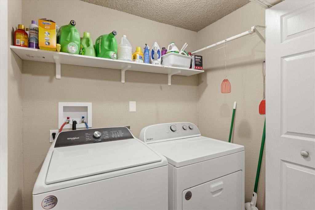 Full sized laundry area.