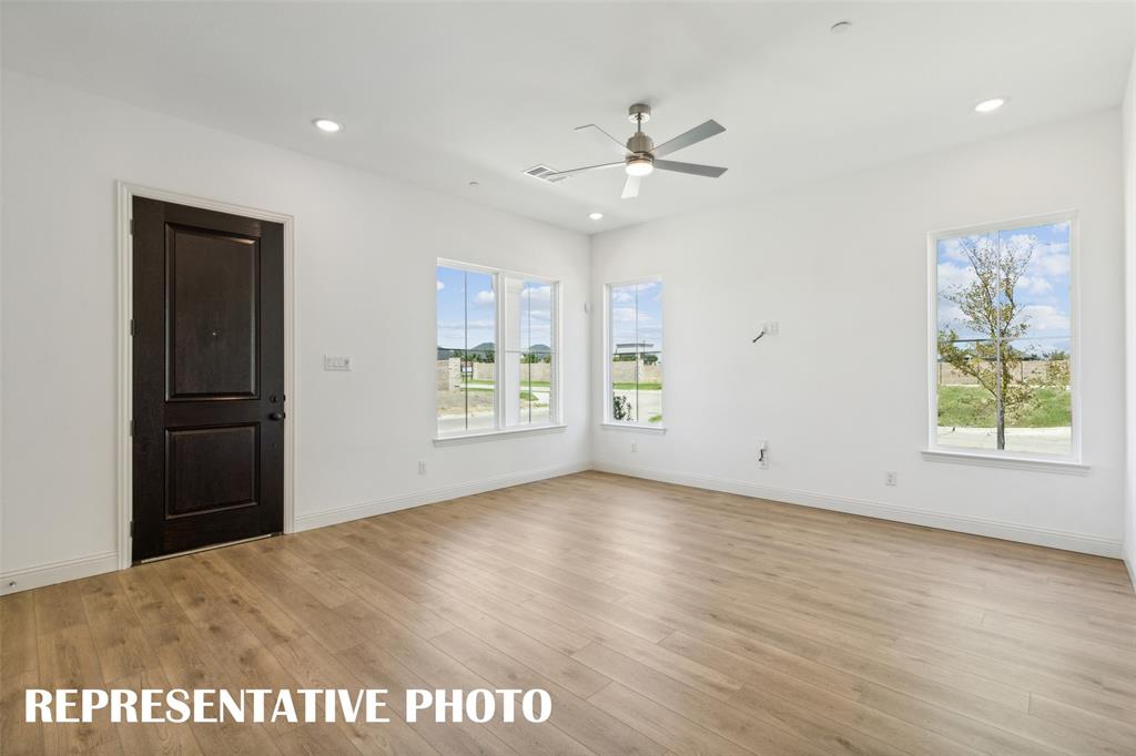 Our end unit Martin plan offers a multiple walls of windows to flood the home with natural light. REPRESENTATIVE PHOTO Our end unit Martin plan offers a multiple walls of windows to flood the home with natural light. REPRESENTATIVE PHOTO