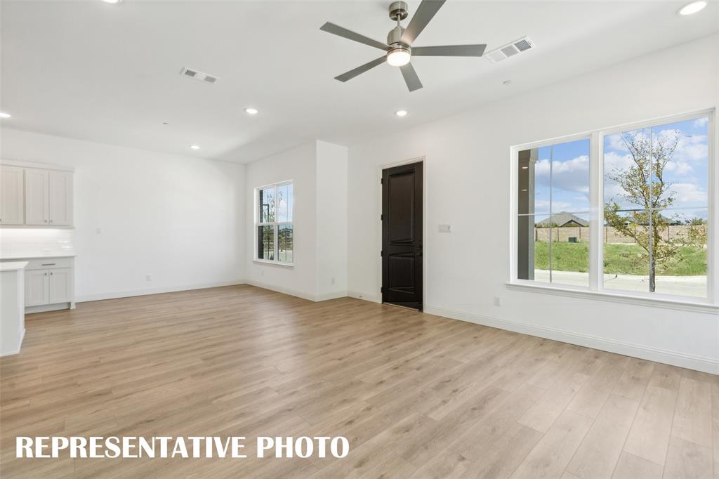 Welcome into your light and bright family room! REPRESENTATIVE PHOTO Welcome into your light and bright family room! REPRESENTATIVE PHOTO