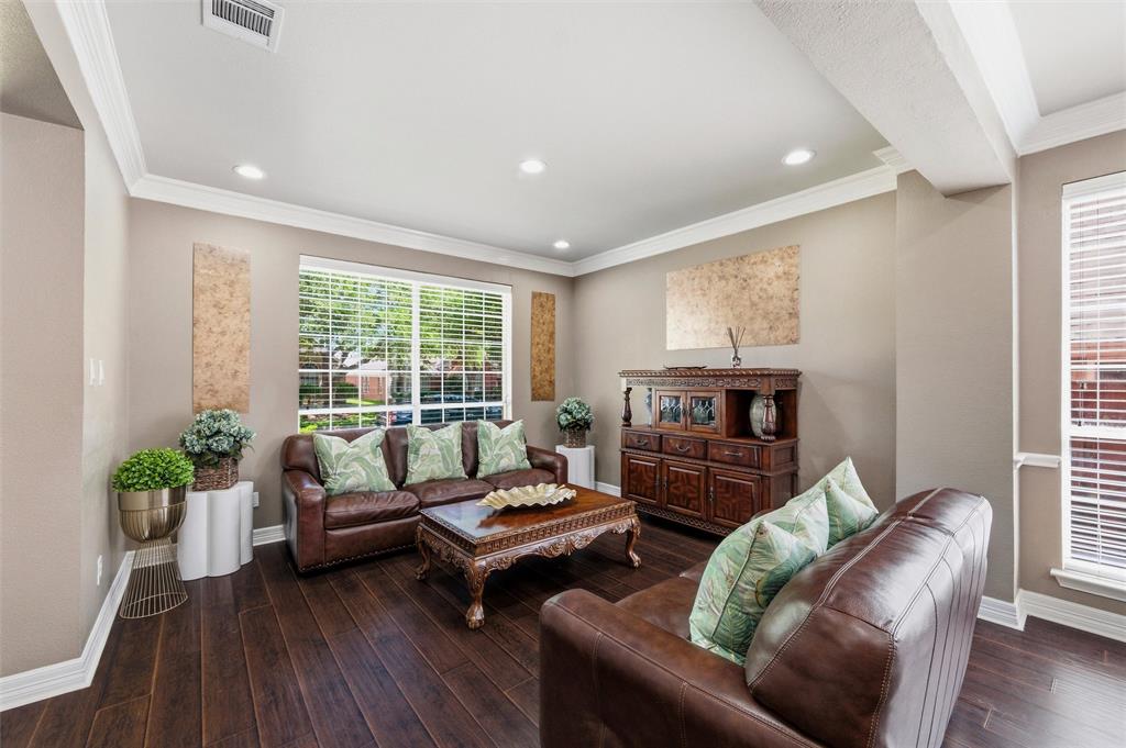 Living Rm with engineered wood, recessed lighting, cand rown molding. Living Rm with engineered wood, recessed lighting, cand rown molding.