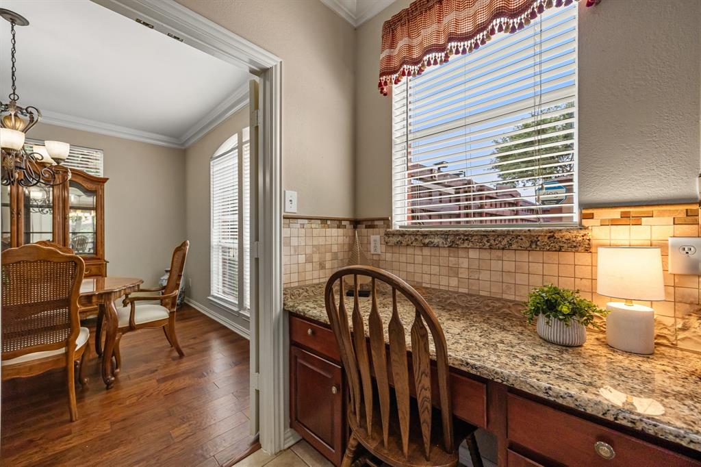 Desk between kitchen and dining room