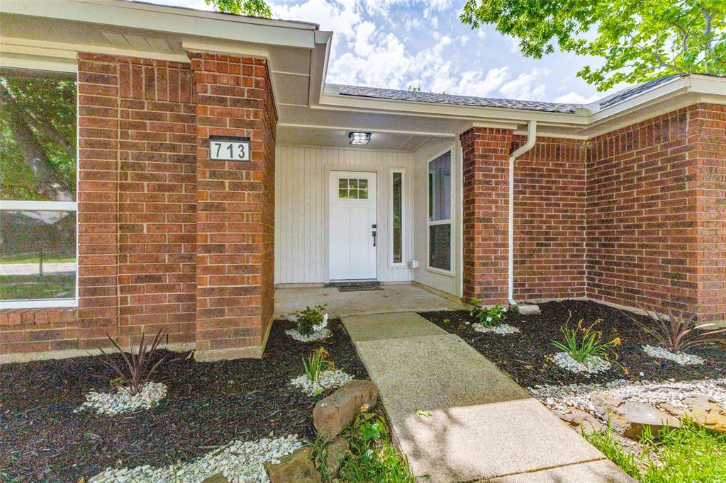 Brick exterior with white siding accents Brick exterior with white siding accents