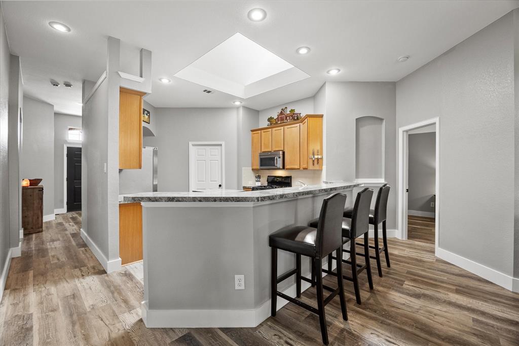 The wrap-around breakfast bar allows seating for casual dining or homework.