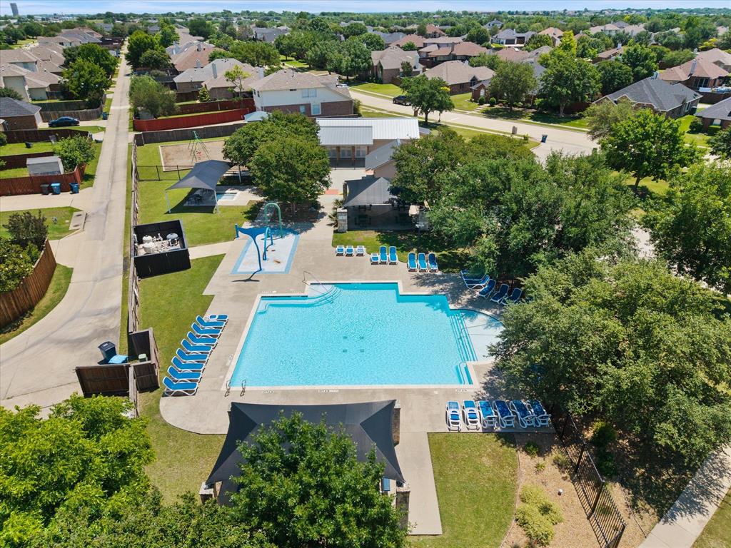 Community pool, kiddie pool, splash park, clubhouse and fenced playground.