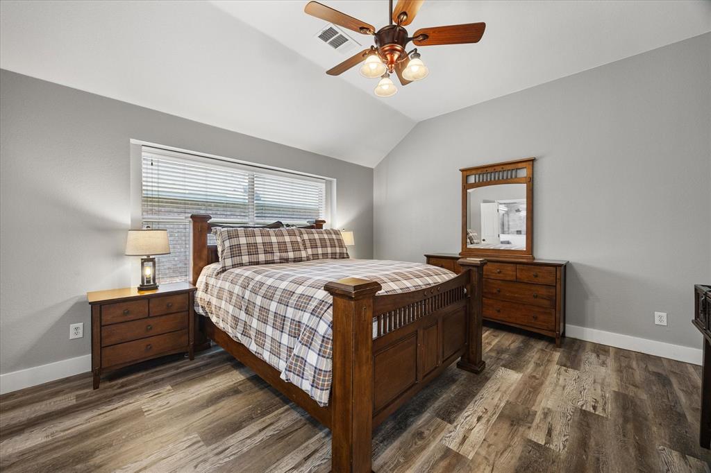 The spacious primary suite is split for privacy.