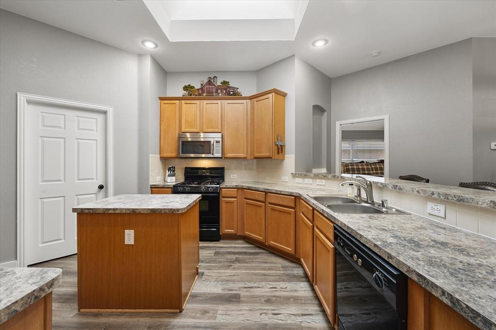 Alternate view of the kitchen.