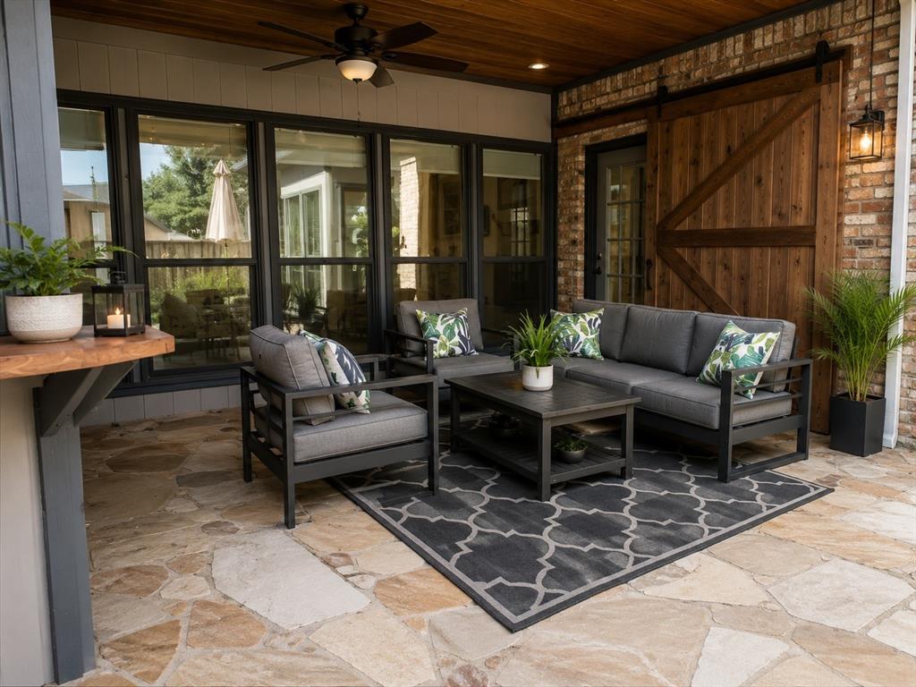 Covered patio with access through 2 doors.  Relaxing view of the pool.