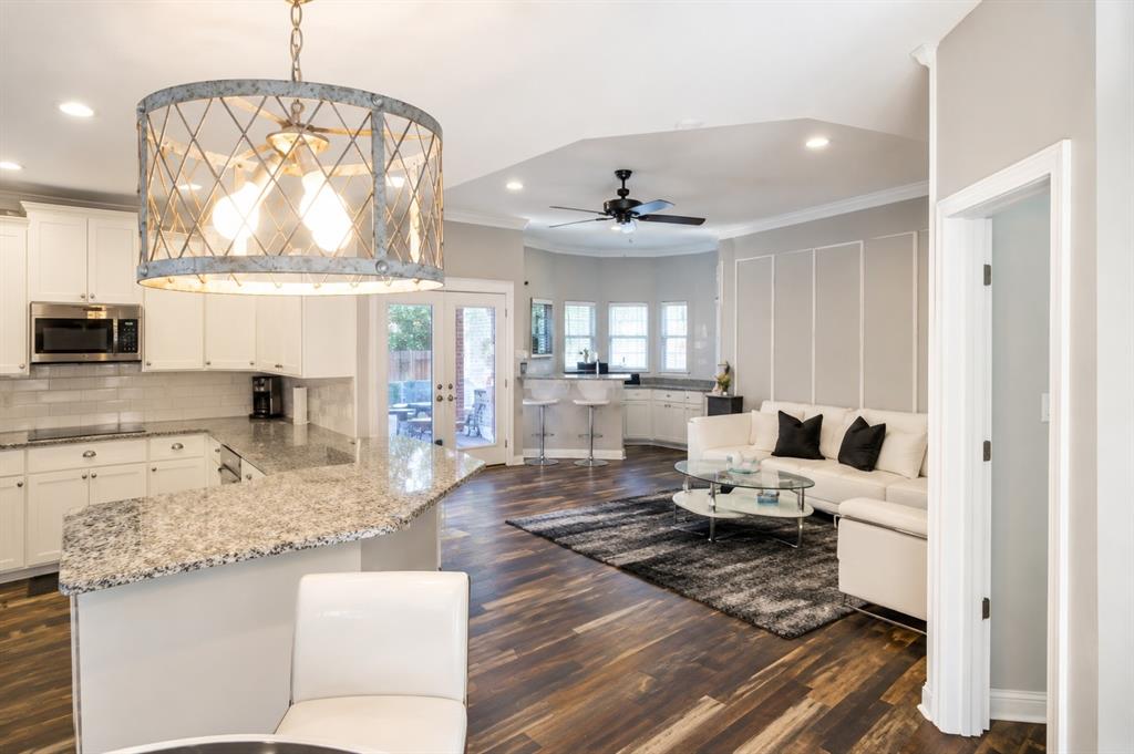 Kitchen and den open to the breakfast area and pool.