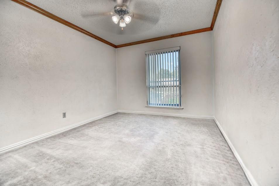 Neutral-toned carpeting throughout