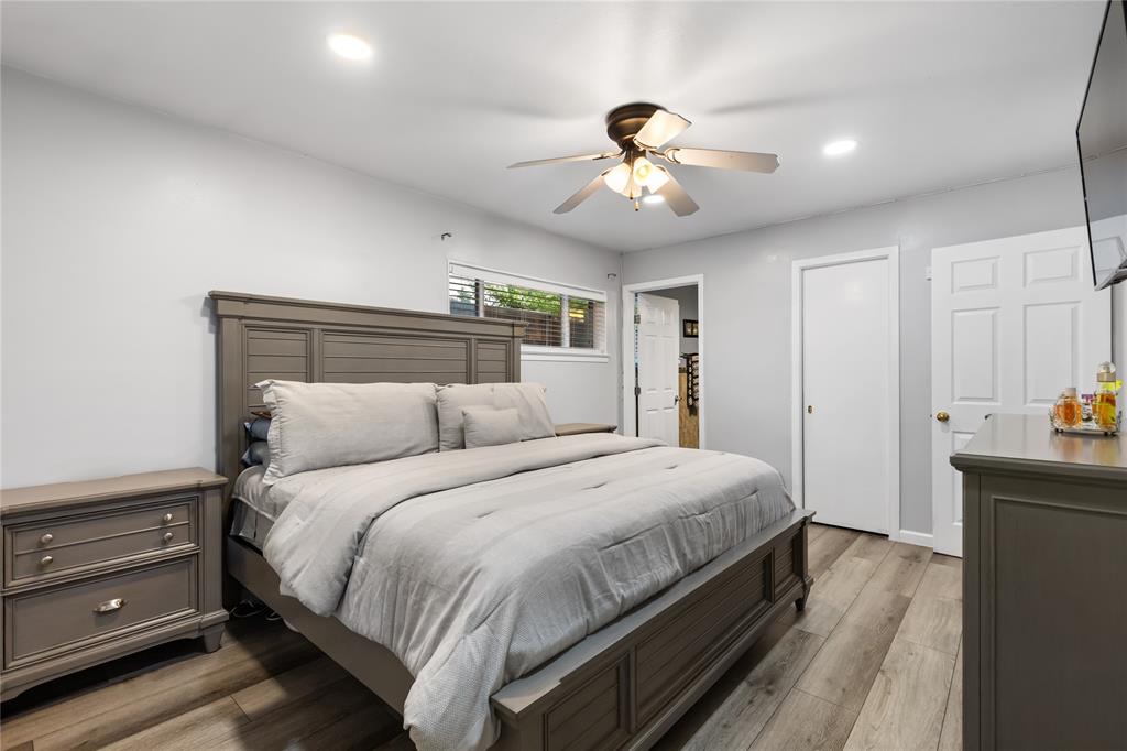 Bedroom featuring wood-finish flooring, recessed lighting, and a ceiling fan