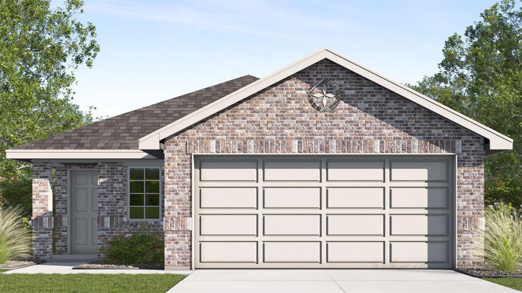 Brick exterior with a shingled roof and a two-car garage Brick exterior with a shingled roof and a two-car garage
