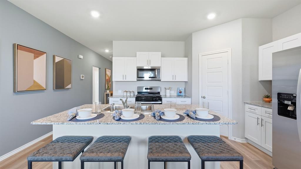 Kitchen - All Home and community information, including pricing, included features, terms, availability and amenities, are subject to change at any time without notice or obligation. All Drawings, pictures, photographs, video, square footages, floor plans, elevations, features, colors and sizes are approximate for illustration purposes only and will vary from the homes as built. Kitchen - All Home and community information, including pricing, included features, terms, availability and amenities, are subject to change at any time without notice or obligation. All Drawings, pictures, photographs, video, square footages, floor plans, elevations, features, colors and sizes are approximate for illustration purposes only and will vary from the homes as built.