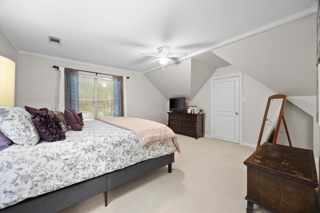 Auxiliary bedroom includes roomy closet and opens onto full bath