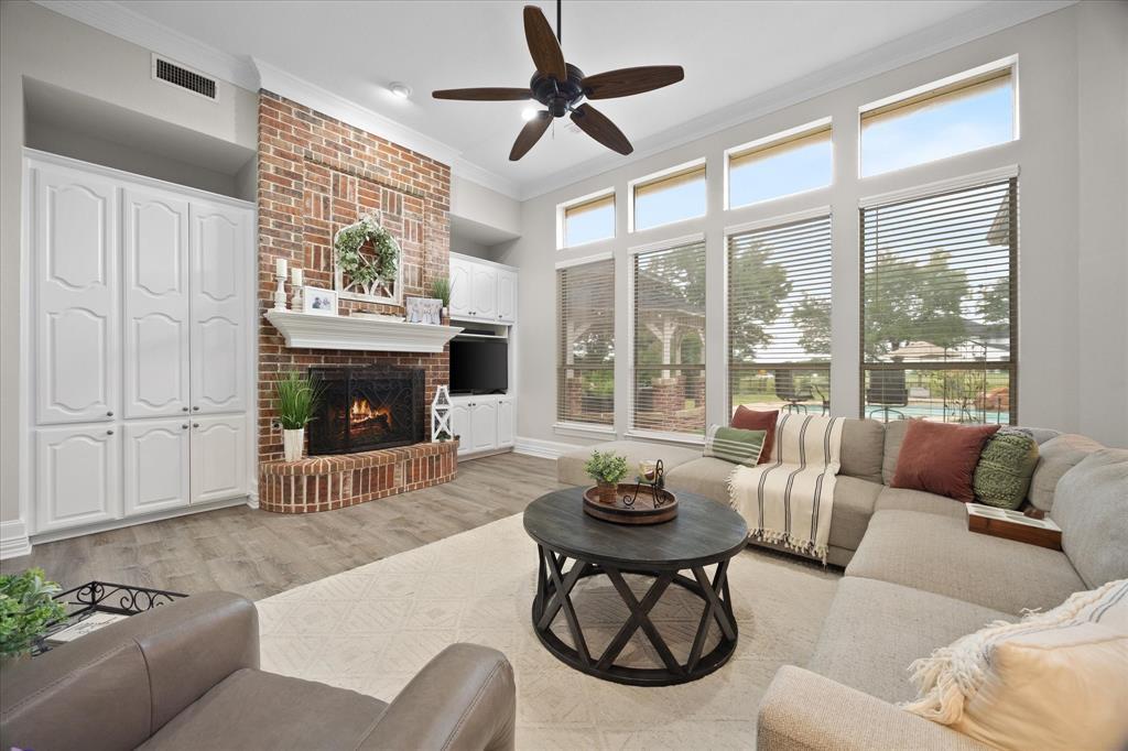 Floor to ceiling windows provide ample lighting and provide stunning views of pool and golf course