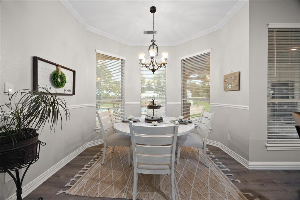 Beautifully detailed dining area includes breathtaking views of pool and golf course