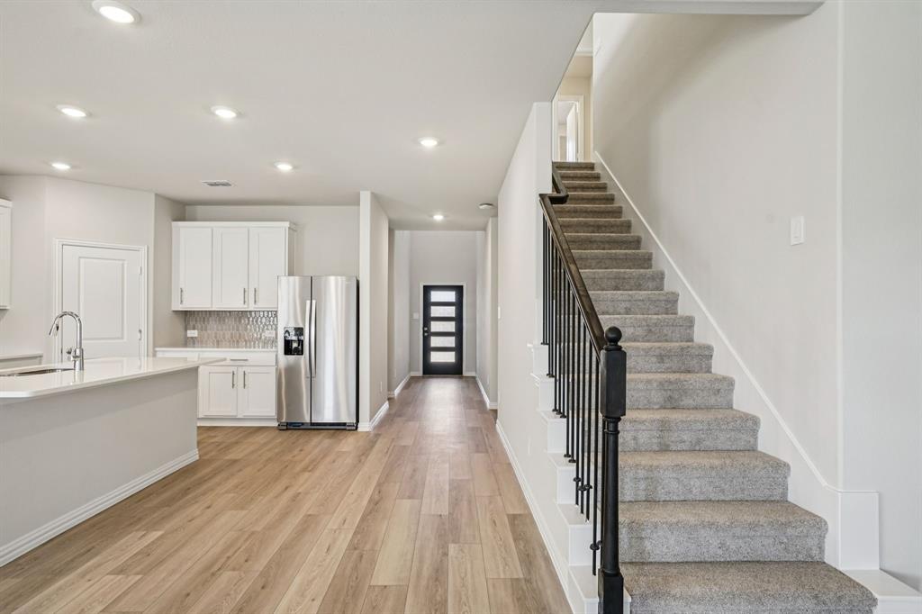 Photo is not of the actual home, but is an inspirational photo of builder’s model home and may depict options, furnishings, and/or decorator features that are not included.