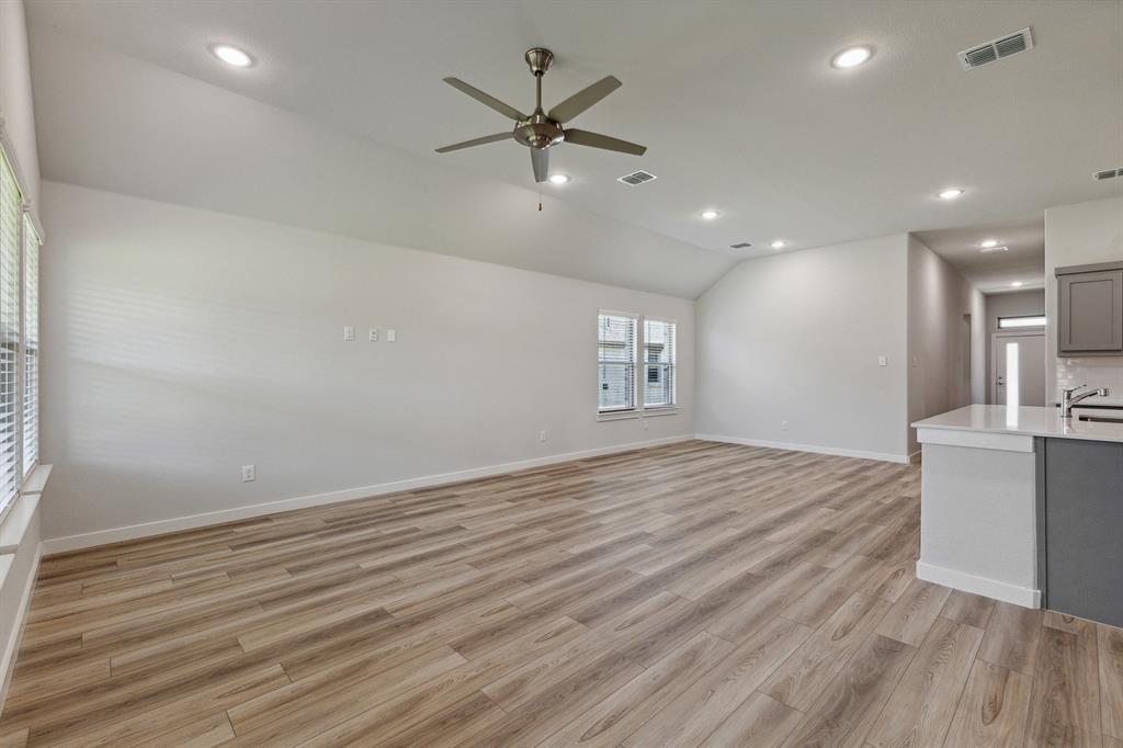 Living room in the Quartz home plan by Trophy Signature Homes – REPRESENTATIVE PHOTO Living room in the Quartz home plan by Trophy Signature Homes – REPRESENTATIVE PHOTO