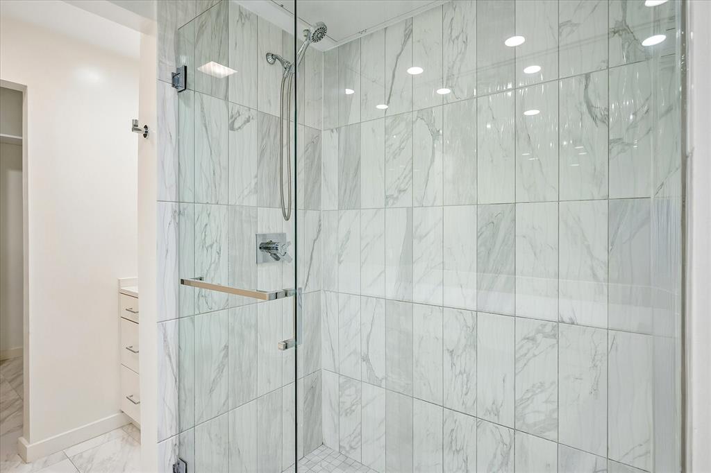 Elegant oversized shower in primary bathroom.