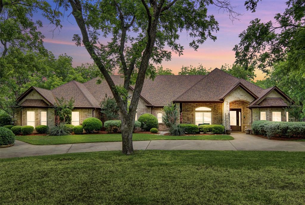 Beautiful sunset view of this lovely home.