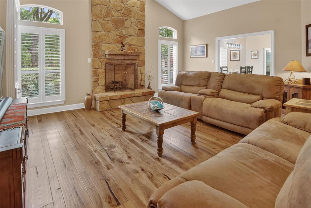 Spacious family room with beautiful stone fireplace. Spacious family room with beautiful stone fireplace.