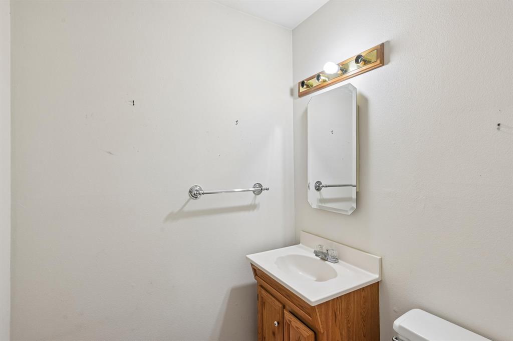 Powder bathroom by 2 car attached garage
