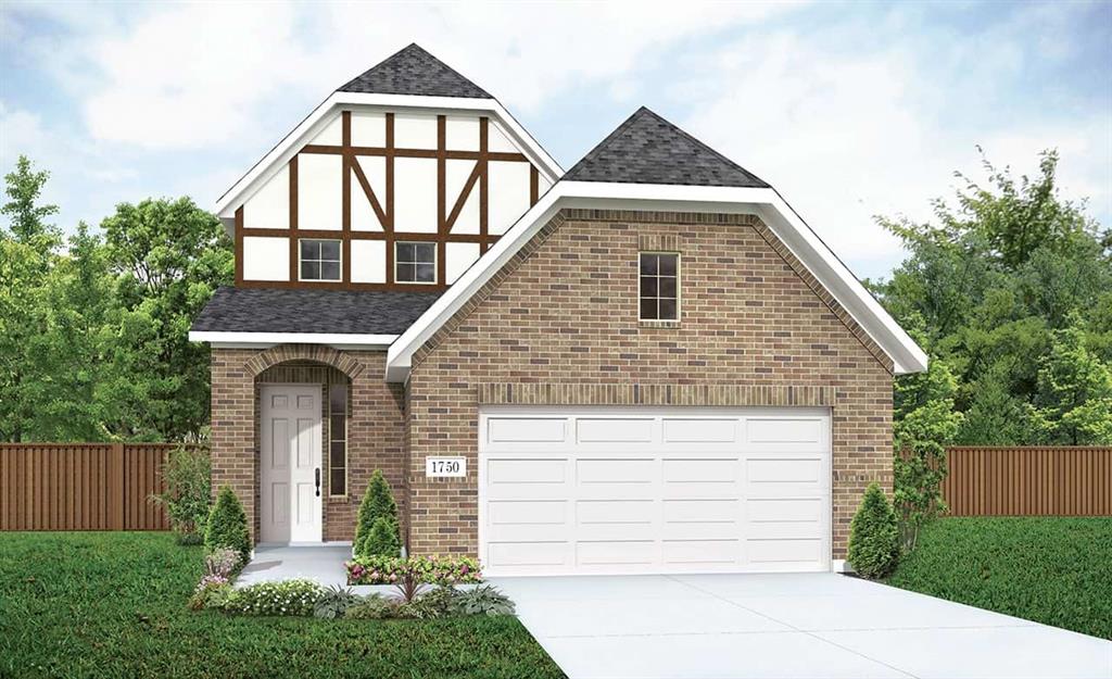 Brick exterior featuring a two-car garage, an arched entry, and dark shingle roofing
